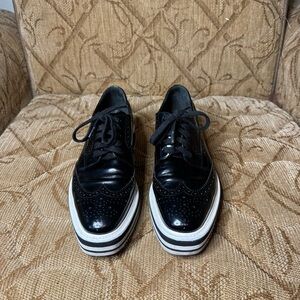 Prada Black Leather Wingtip Platform Brogues black FEMALE‎ Platforms EU 38